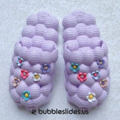 Diseño de flor púrpura Bubble Slides
